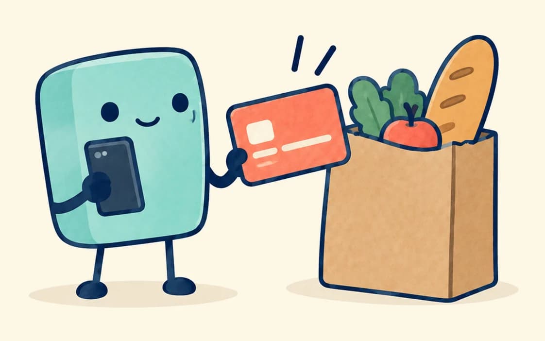 The agent holds a phone and an orange payment card towards a paper bag of groceries with bread, an apple and leafy greens.
